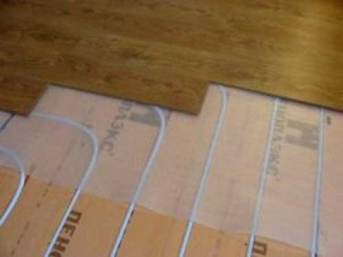 Водяной теплый пол под ламинат без стяжки. Свойства и особенности использования