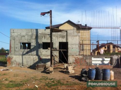 Облицовка натуральным камнем дома.  Как приклеить камень на бетонные стены